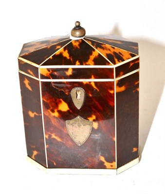 Lot 957 - A Regency Tortoiseshell and Ivory Banded Tea Caddy, of canted rectangular form, with ball...