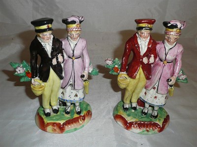 Lot 212 - Two Staffordshire figures of gentlemen and a lady