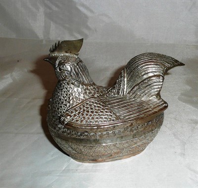 Lot 214 - An Asian white metal hen