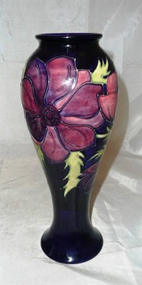 Lot 221 - A Moorcroft vase decorated with flowers (silver line)