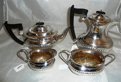 Lot 261 - A 'silver' Viners teapot, water jug, sucrier and milk jug (4)