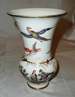 Lot 276 - An 18th century Chelsea porcelain vase, painted with birds and highlighted with gilt (heavily...