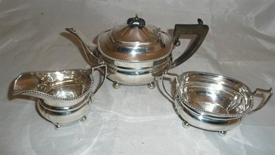 Lot 288 - Silver three piece Mappin & Webb tea service, inscribed