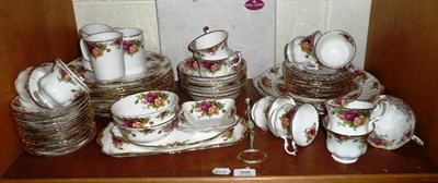 Lot 306 - A shelf of Royal Albert 'Old Country Roses' tea and dinner ware