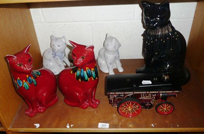 Lot 307 - Two Poole pottery cats, three others, lace bobbins etc