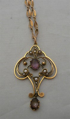 Lot 316 - An amethyst and seed pearl pendant on chain