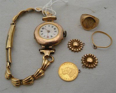 Lot 317 - A lady's wristwatch, a 9ct gold signet ring, coin and discs