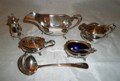 Lot 322 - Silver sauceboat, small cream jug, three piece condiment set and a sauce ladle