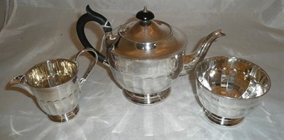 Lot 340 - A silver three piece tea set