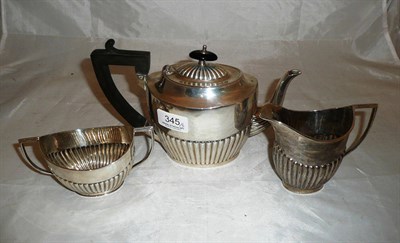 Lot 345 - Composite silver three piece tea service