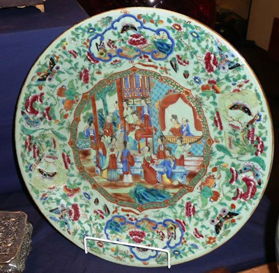 Lot 360 - A 19th century Chinese famille rose charger, decorated with figures and butterflies (drilled)