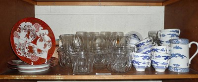 Lot 382 - A shelf of decorative ceramics and glass including glass rinsers, part tea services etc