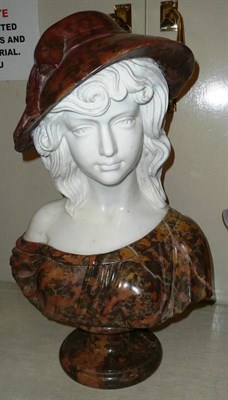 Lot 388 - A carved marble bust of a maiden