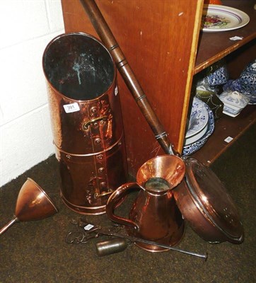 Lot 391 - A copper coal scuttle, warming pan, jug and a steel guard