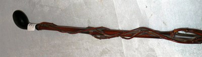 Lot 393 - A German walking cane with entwined tendril decoration and an album of stamps commemorating the...