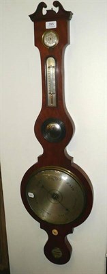 Lot 395 - A mahogany wheel barometer with swan neck pediment