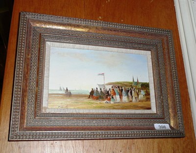 Lot 398 - R Cavelle, a beach scene with figures, oil on panel