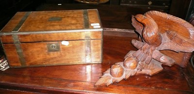 Lot 428 - A brass inlaid mahogany writing slope and a carved eagle wall bracket