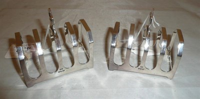 Lot 432 - A pair of silver toast racks