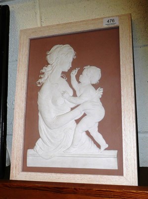 Lot 476 - A Royal Worcester relief decorated plaque of a mother and child, by Arnold Machin, 1970's, 35cm...