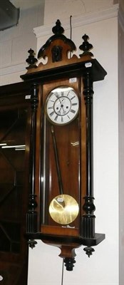 Lot 521 - A twin weight Vienna wall clock