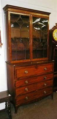 Lot 526 - A late George III mahogany secretaire bookcase, circa 1820, with glazed astragal doors...