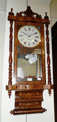 Lot 528 - An inlaid striking wall clock