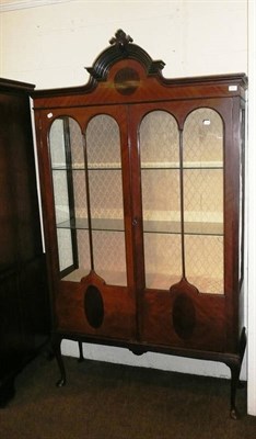 Lot 541 - A glazed mahogany display cabinet