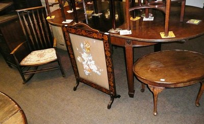 Lot 583 - Oval walnut coffee table, Arts & Crafts style chair and a fire screen (3)