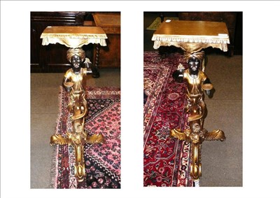 Lot 591 - Pair of gilt Blackamoor figures