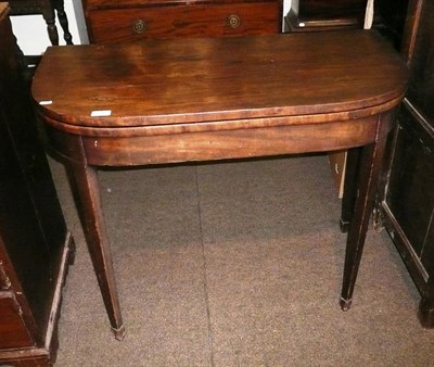 Lot 596 - A Georgian D-end fold over games table