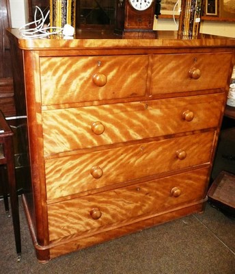 Lot 600 - A satin walnut four height chest of drawers