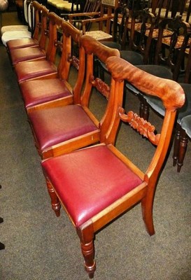 Lot 607 - A set of six William IV satin walnut dining chairs with drop in seats