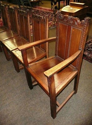 Lot 615 - A set of five oak dining chairs with panel seats (4+1)