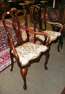 Lot 617 - A pair of 1920s walnut carver chairs