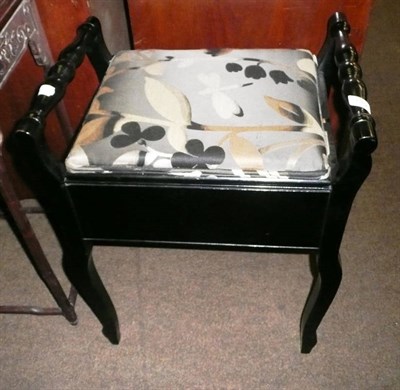 Lot 645 - Ebonised piano stool