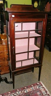 Lot 653 - An Edwardian inlaid mahogany display cabinet