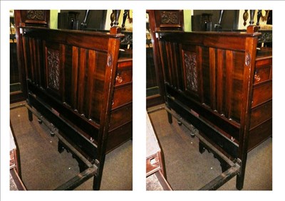 Lot 670 - An Edwardian mahogany double bed frame