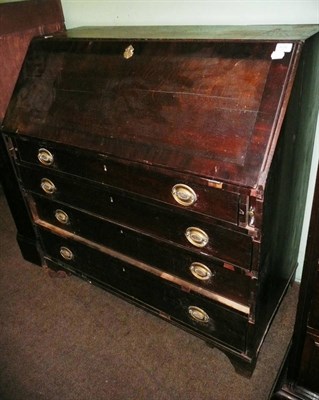 Lot 676 - An oak bureau