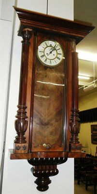 Lot 687 - A walnut cased twin weight Vienna wall clock