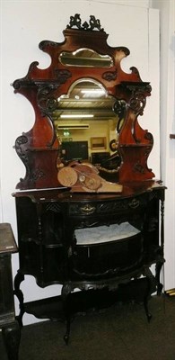 Lot 688 - A late Victorian carved mahogany chiffonier, with mirrored gallery back and a bow fronted...