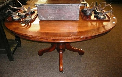 Lot 693 - Mahogany oval breakfast table