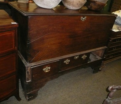 Lot 696 - An 18th century oak coffer on stand