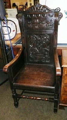 Lot 700 - Victorian carved oak enclosed armchair