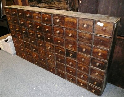 Lot 779 - A bank of seventy Chemist's drawers