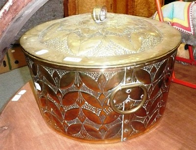 Lot 793 - A hammered brass log bin