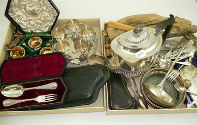 Lot 8 - Two boxes of assorted silver plate, flatware, knife rests and a presentation silver teapot