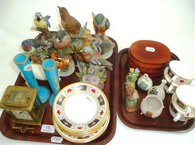 Lot 15 - A set of four Royal Crown Derby cups, saucers and side plates, carriage clock (a.f), bird ornaments