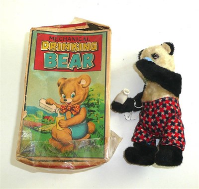 Lot 18 - A 'Drinking Bear' wind-up toy, boxed