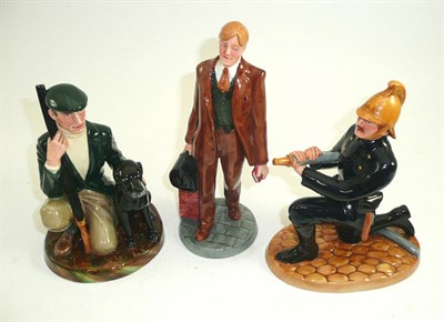 Lot 21 - Three Royal Doulton figures; 'Fireman' HN4411, 'Doctor' HN4286 and 'The Gamekeeper' HN2879